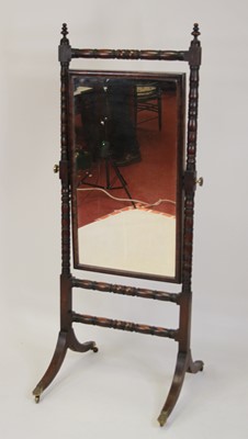 Lot 2496 - A Regency mahogany cheval mirror, the...