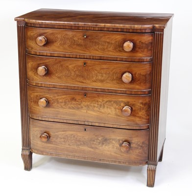 Lot 2511 - A Regency mahogany bowfront chest, the four...