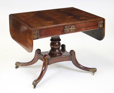 Lot 2500 - A Regency rosewood and inlaid pedestal sofa...