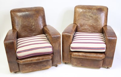 Lot 1341 - A pair of Art Deco tan leather and studded...