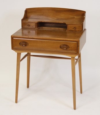 Lot 1392 - A 1960s Ercol light elm desk, model No.437,...