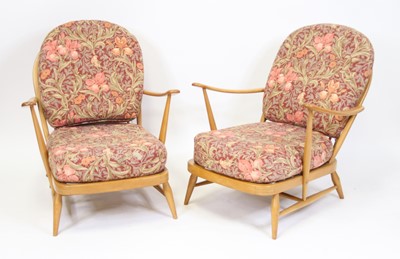 Lot 1388 - A pair of 1960s Ercol light elm stickback open...