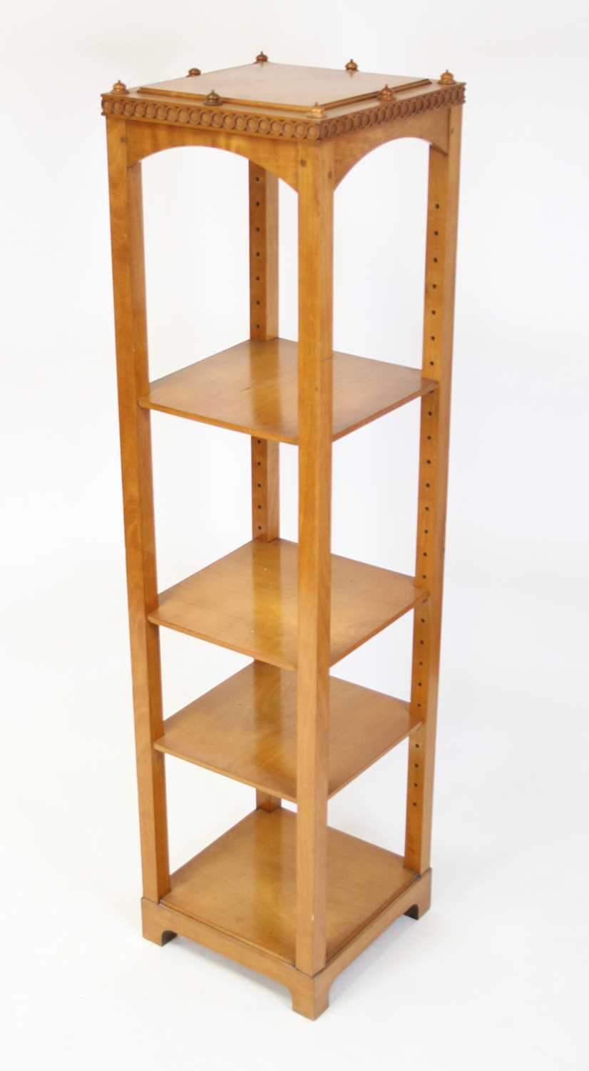Lot 1337 - An Arts & Crafts walnut four-tier whatnot, of...