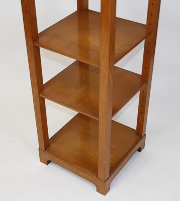 Lot 1337 - An Arts & Crafts walnut four-tier whatnot, of...