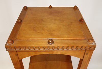 Lot 1337 - An Arts & Crafts walnut four-tier whatnot, of...