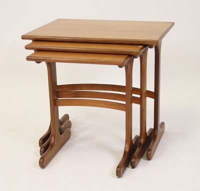 Lot 1360 - A 1960s G-Plan teak nest of three occasional...