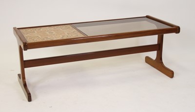 Lot 1358 - A 1960s G-Plan teak, tile inset and smoky...