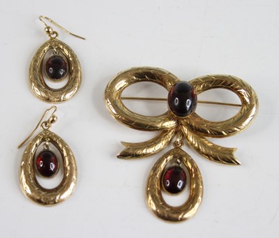 Lot 2225 - A 9ct yellow gold garnet brooch and earrings...