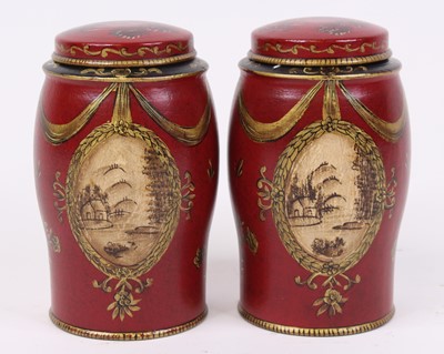 Lot 10 - A pair of reproduction red toleware canisters,...