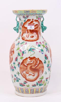 Lot 11 - A Chinese porcelain vase, enamel decorated...