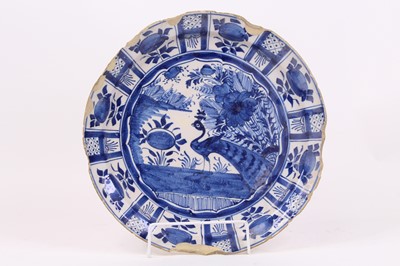 Lot 25 - An 18th century Delft blue and white dish,...