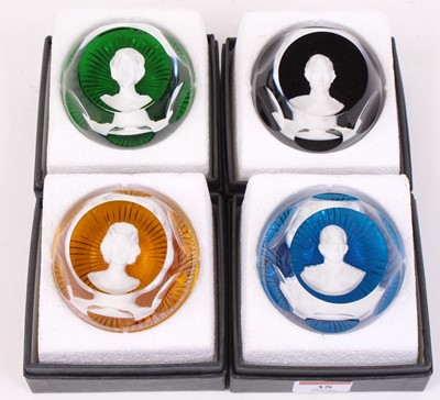 Lot 35 - A set of four Baccarat Crystal paperweights,...