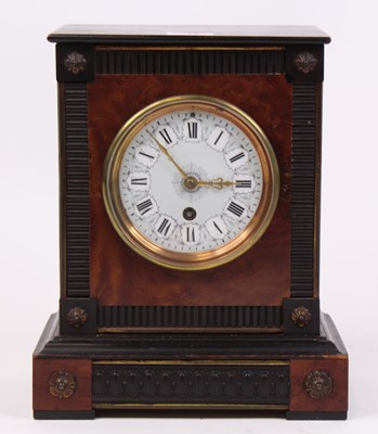 Lot 42 - A Victorian ebonised mantel clock, the...