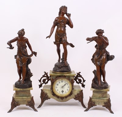 Lot 46 - A 19th century spelter and onyx figural clock...