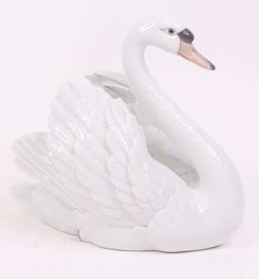 Lot 58 - A Lladro porcelain model of a swan, h.19cm
