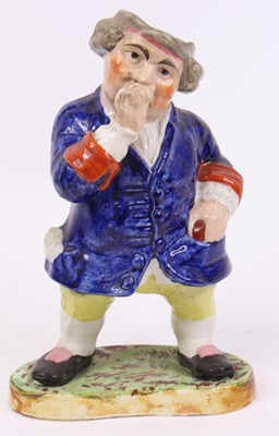 Lot 63 - A Victorian Staffordshire figure of a...