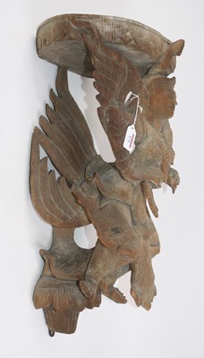 Lot 121 - An Asian carved teak figural wall bracket, h.61cm