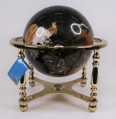 Lot 132 - A terrestrial globe, inlaid with polished...