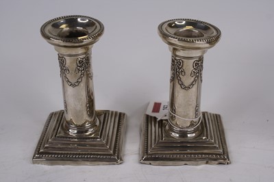 Lot 253 - A pair of Victorian weighted silver dwarf...