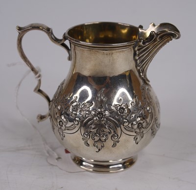 Lot 256 - A Victorian silver cream jug, of baluster...