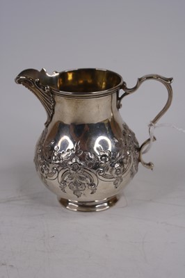 Lot 256 - A Victorian silver cream jug, of baluster...