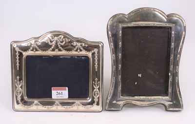 Lot 261 - A silver-clad easel photograph frame, repousse...