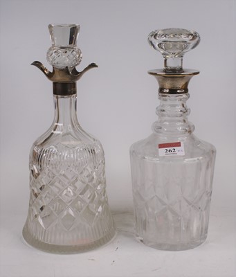Lot 262 - A George VI cut glass decanter, of bell shape,...