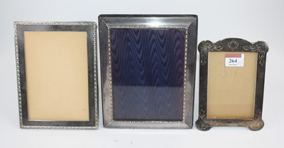 Lot 264 - A silver-clad easel photograph frame, of...