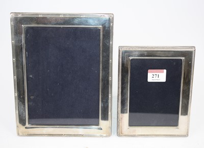Lot 271 - An Elizabeth II silver clad easel photo frame,...