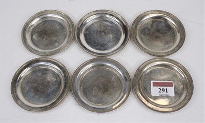 Lot 291 - A set of six continental silver coasters, each...