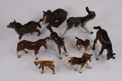 Lot 224 - A collection of models of foals to include...