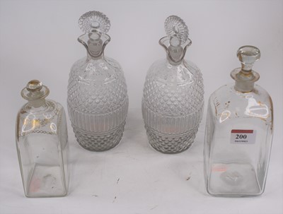 Lot 200 - A pair of 19th century moulded glass spirit...