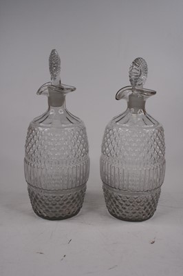 Lot 200 - A pair of 19th century moulded glass spirit...