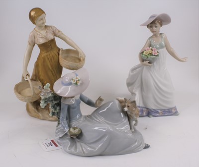 Lot 205 - Two Lladro porcelain figures of ladies,...