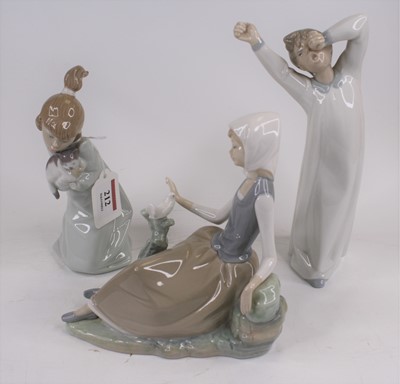 Lot 212 - Three Lladro porcelain figures, largest height...