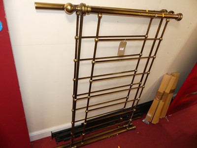 Lot 1163 - A contemporary polished tubular brass double...