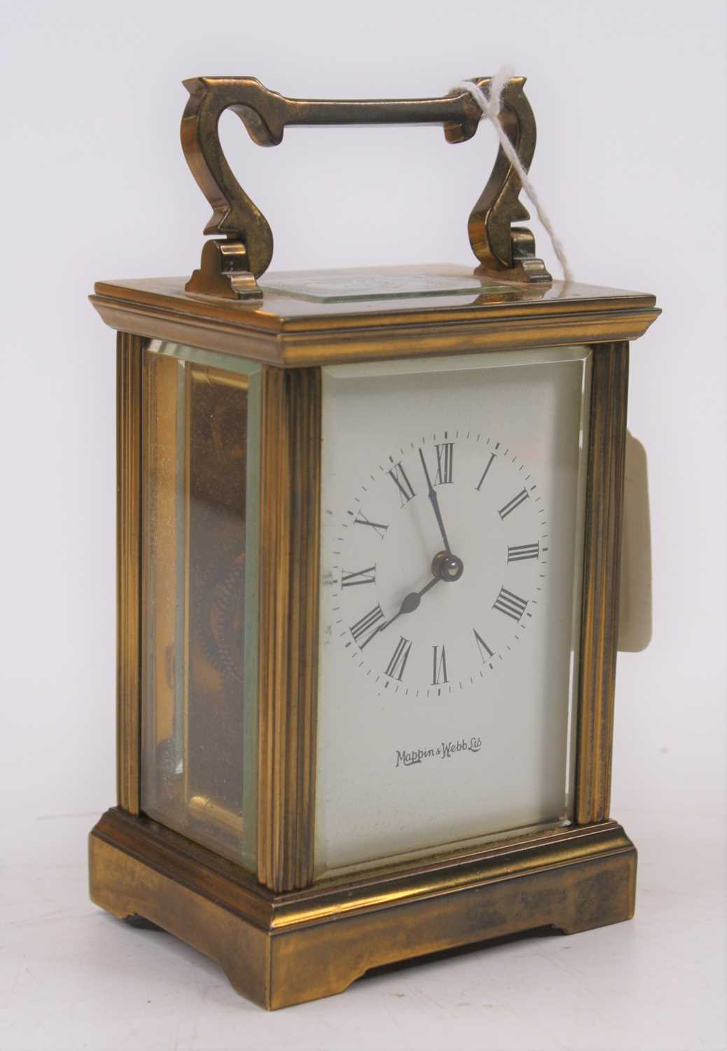Lot 494 - A Mappin & Webb brass cased carriage clock,...