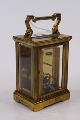 Lot 494 - A Mappin & Webb brass cased carriage clock,...