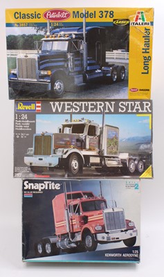 Lot 768 - A collection of three various boxed 1/24 and...