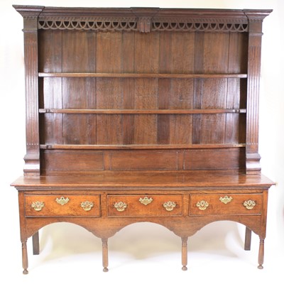 Lot 1145 - A George III joined oak dresser, having an...