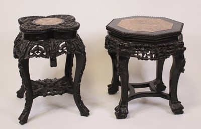 Lot 2367 - A Chinese carved hardwood marble topped squat...