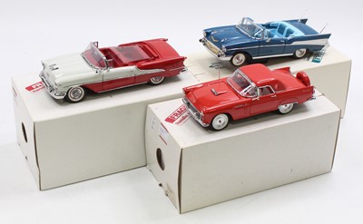 Lot 867 - A collection of three 1/24 scale Danbury Mint...