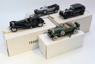 Lot 871 - A collection of four various boxed 1/24 scale...