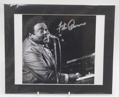 Lot 189 - Fats Domino, a black and white photograph of...