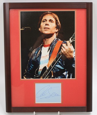 Lot 185 - Paul Simon, signed autograph page in blue ink...