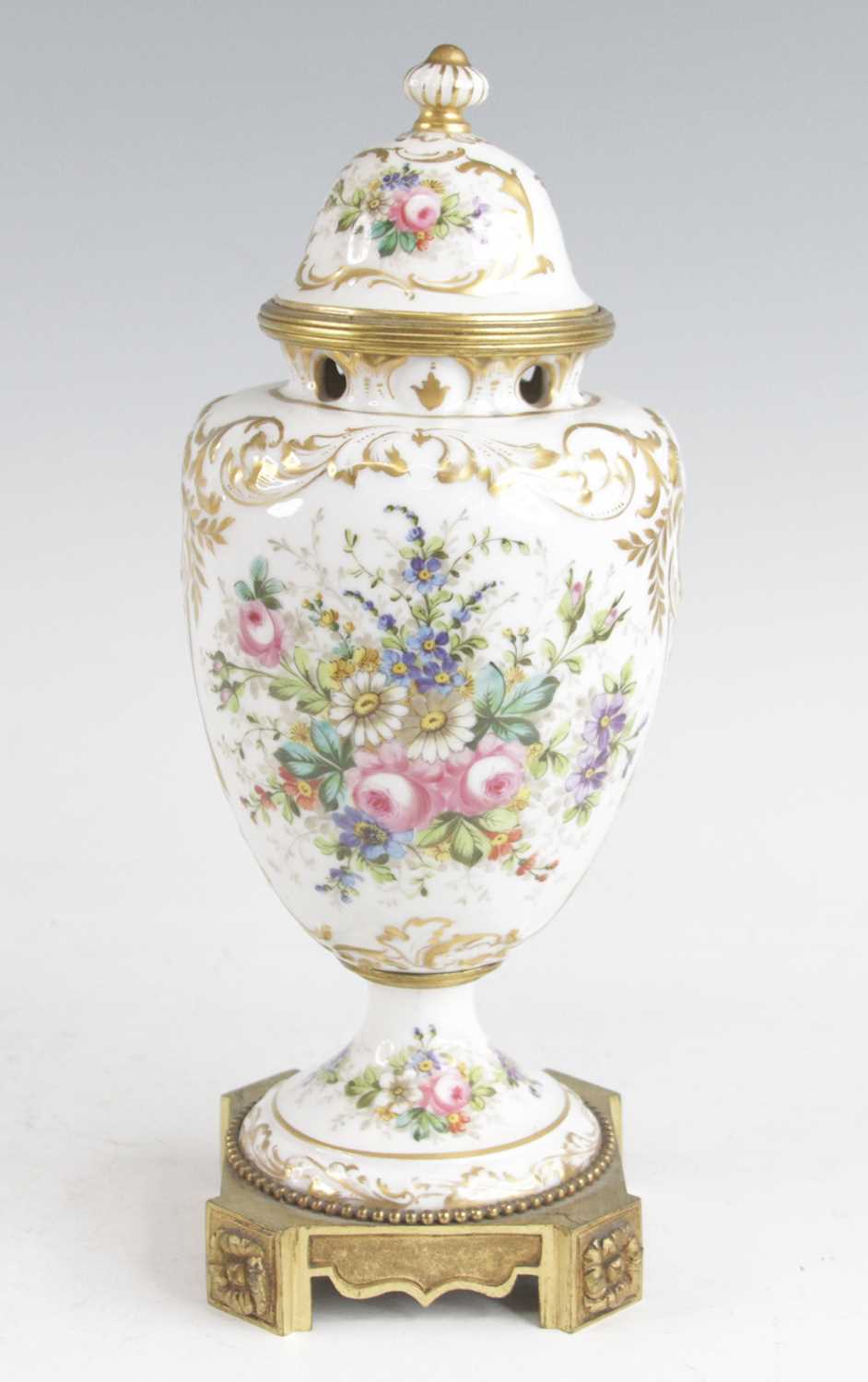 Lot 2081 - A French porcelain and gilt metal pot purri,...