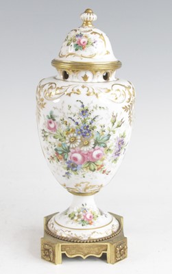 Lot 234 - A French porcelain and gilt metal pot purri,...