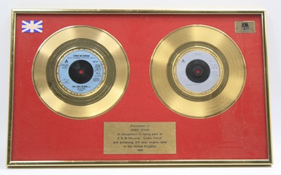 Lot 144 - A pair of 7" gold presentation discs for Chris...