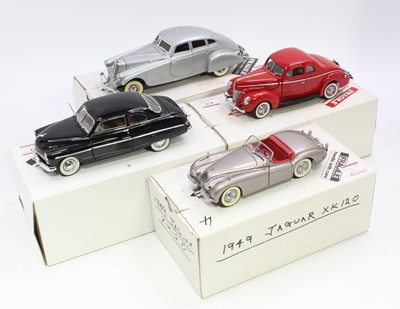 Lot 876 - A collection of four various boxed 1/24 scale...