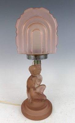 Lot 1214 - An Art Deco moulded and frosted peach glass...